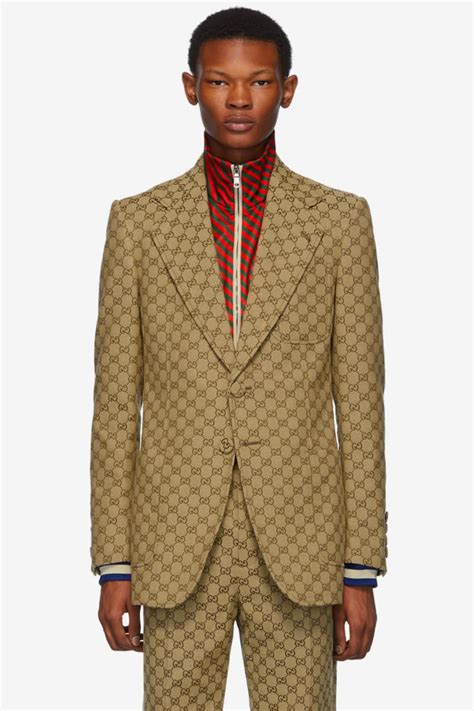 gucci tan suit|who makes Gucci suits.